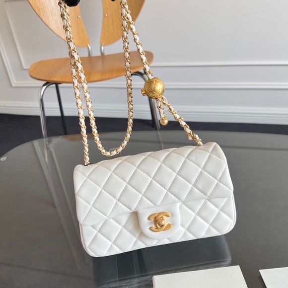 CHANEL Handbags - CHANEL White Quilted Crossbody Bag with Gold Chain